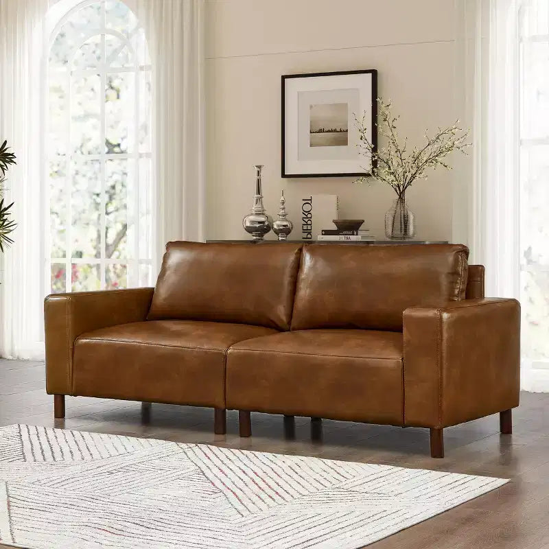 Dwuosobowa sofa w stylu nowoczesnym z połowy XX wieku, tapicerowana sztuczną skórą